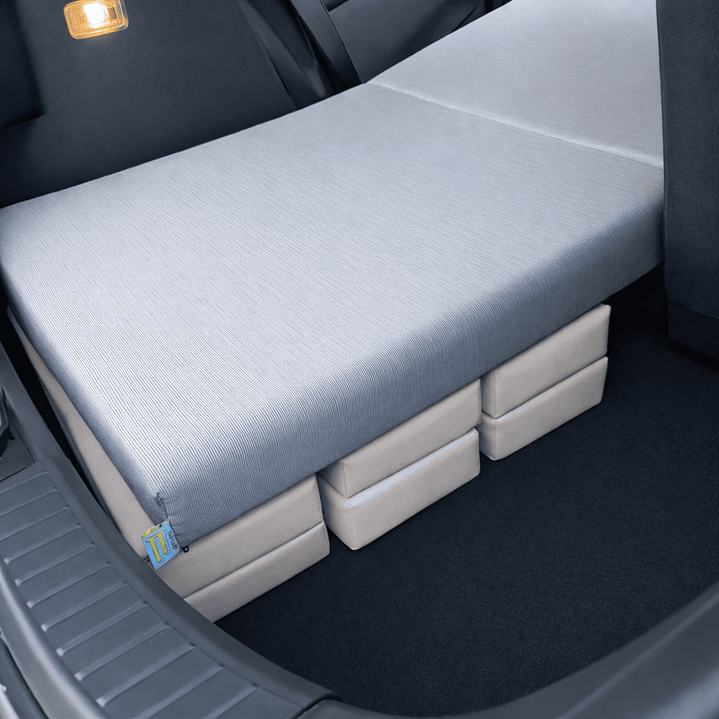 Solución con un apoyo bajo el último tramo para nivelar el suelo del coche